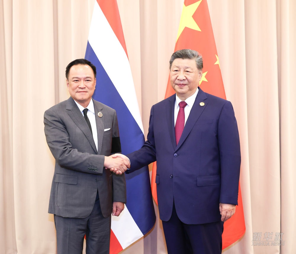 رئيس الصين شي يلتقي رئيس وزراء تايلاند