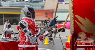 الصين : فرقة روبوتية تنير شوارع شنتشن